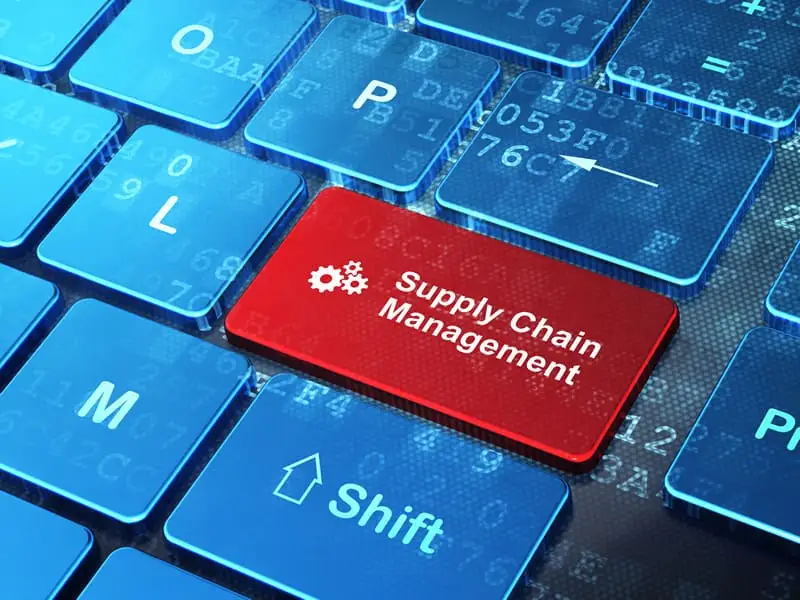 Digital keyboard with a red key labeled Supply Chain Management