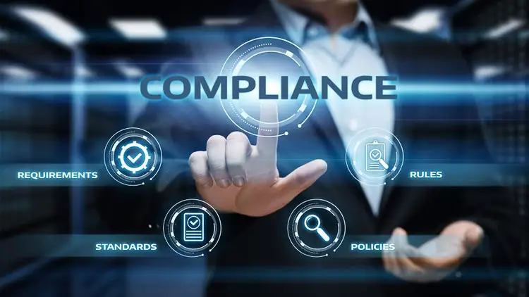 A businessman touches a digital compliance interface showing icons for requirements, standards, policies, and rules